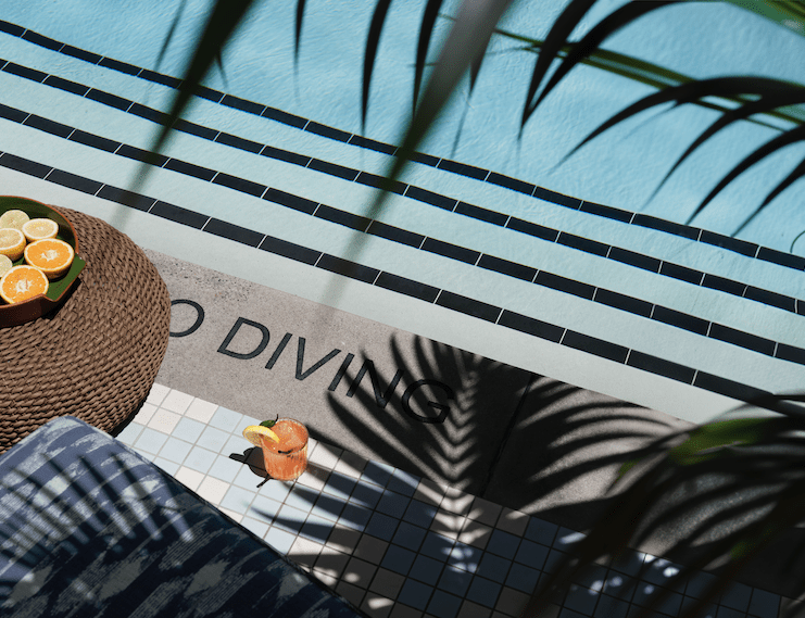 Poolside Cocktails and skylight view at The Aster Los Angeles members club